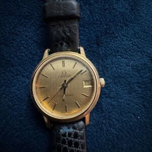 Omega Gold Women's Watch with Black Strap